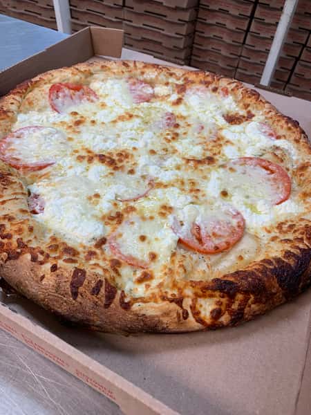 Large tomato and cheese pizza with a thick, golden-brown crust in an open cardboard box.