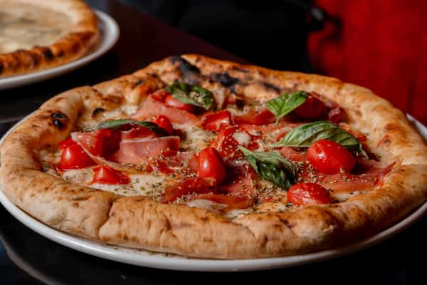 a-close-up-of-a-freshly-made-gourmet-pizza