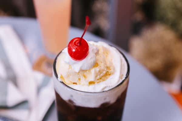 shake with whipped cream and cherry on top