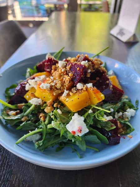Beet salad with goat cheese and candied pecans