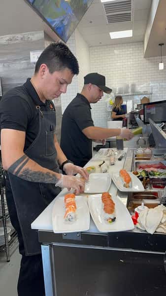 Staff Making Sushi