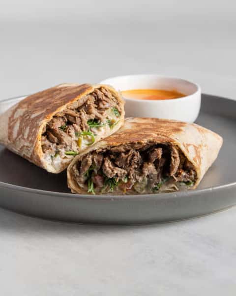 Big beef energy in every bite! 🤤🌯
Our Angus Beef Shawarma Wrap brings together juicy Angus beef shawarma, warm saj bread, creamy hummus, fresh tomatoes, raw onions, crunchy pickles, and smooth tahini sauce. Every bite brings the goods! 💯
🌯 Craving your wrap fix? Come dine with us or order online for pickup!
🌐 www.andshawarma.co/popmenu-order
#AndShawarma #AngusBeefShawarma #ShawarmaWrap #HalalFood #MediterraneanFood #GaithersburgEats #WrapGoals