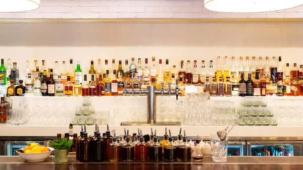 bar area with large variety of liquors