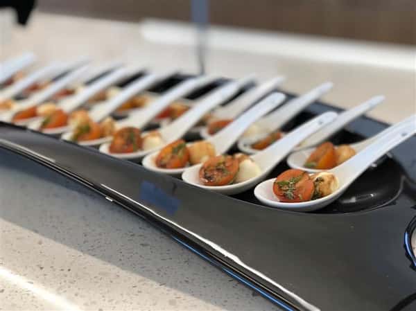 an assortment of Caprese Spoon's
