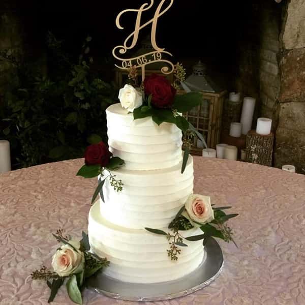 wedding cake with fresh roses