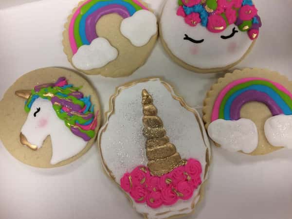 Unicorn and rainbow decorated sugar cookies