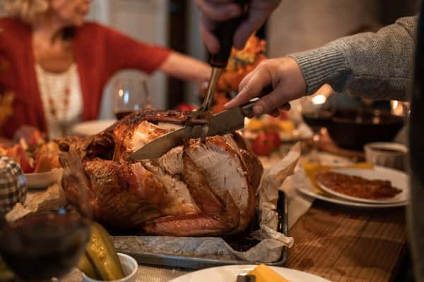 Carving a turkey.