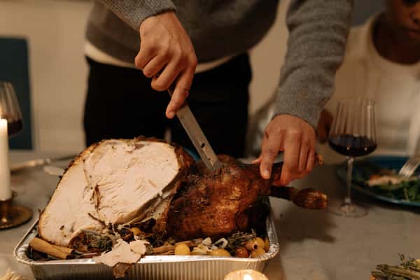 Carving a turkey.