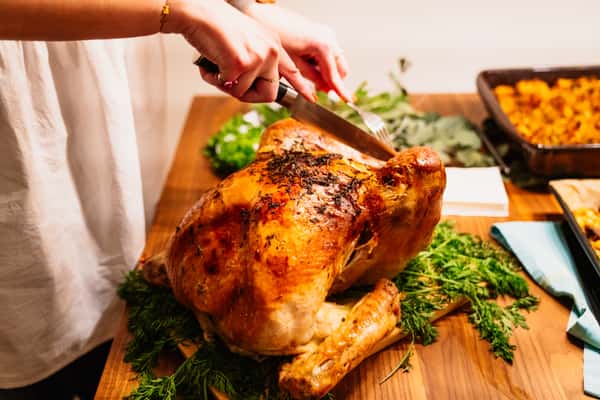Carving a turkey.