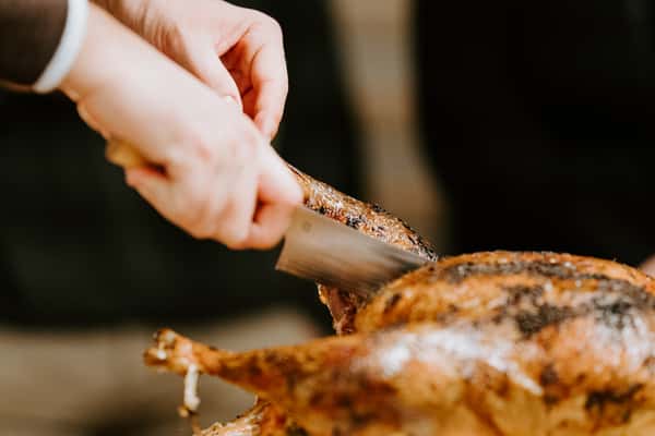Carving a turkey.