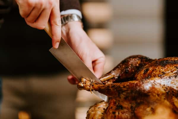 Carving a turkey.