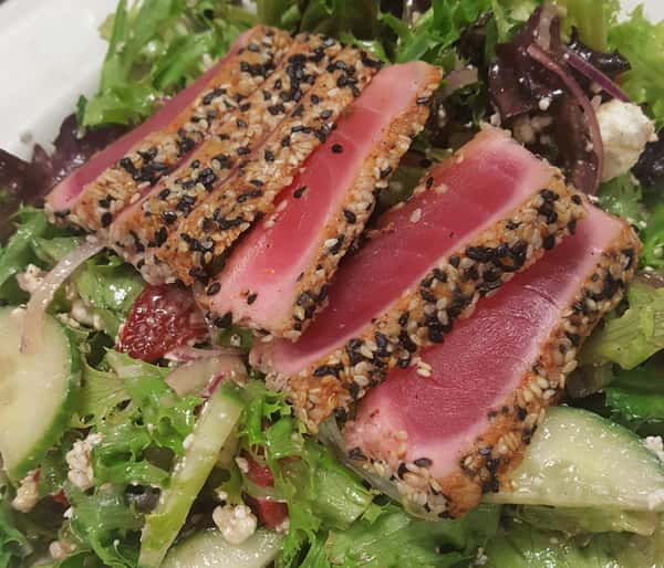 Salad with sesame crusted ahi tuna.