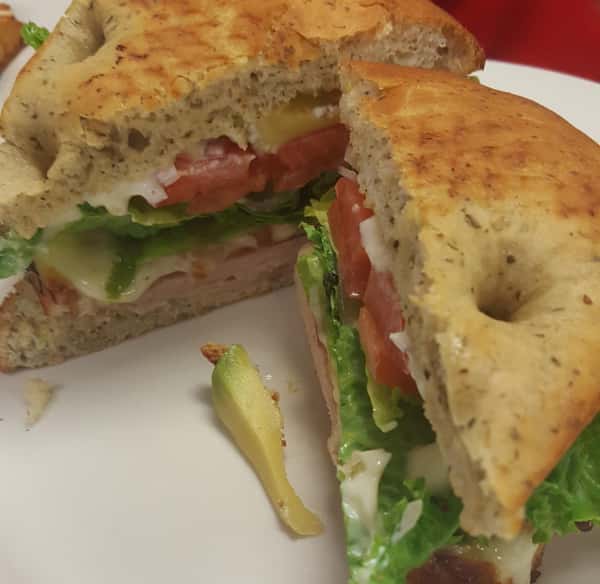 Bagel sandwich with tomato, lettuce, cheese