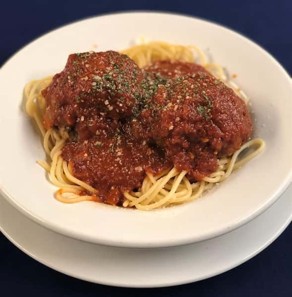 spaghetti and meatballs covered in marinara sauce
