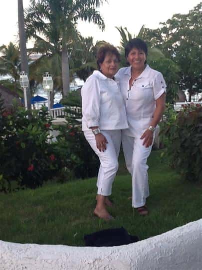 two females posing for picture
