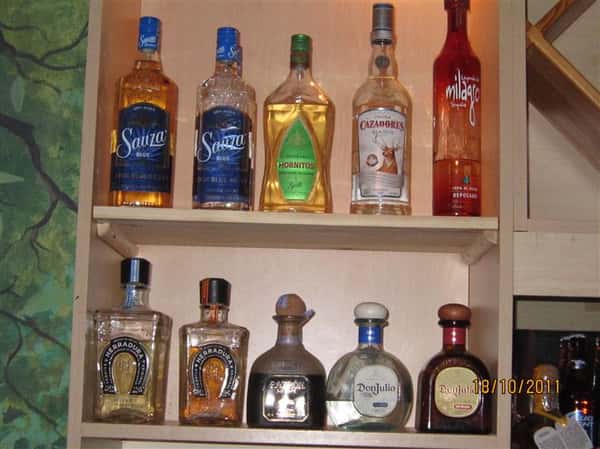 shelves with alcohol bottles
