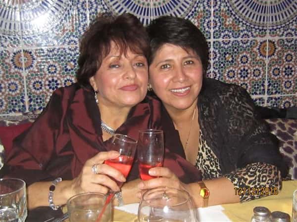 two females posing for picture
