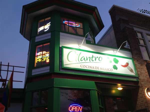 cilantro sign with lights at night