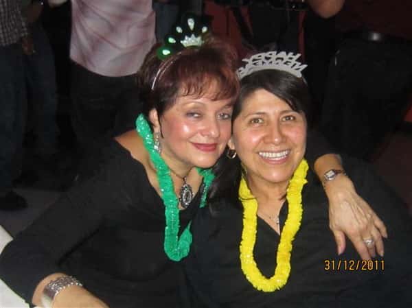 two females posing for picture