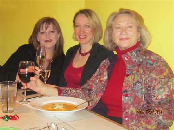 three females posing for picture