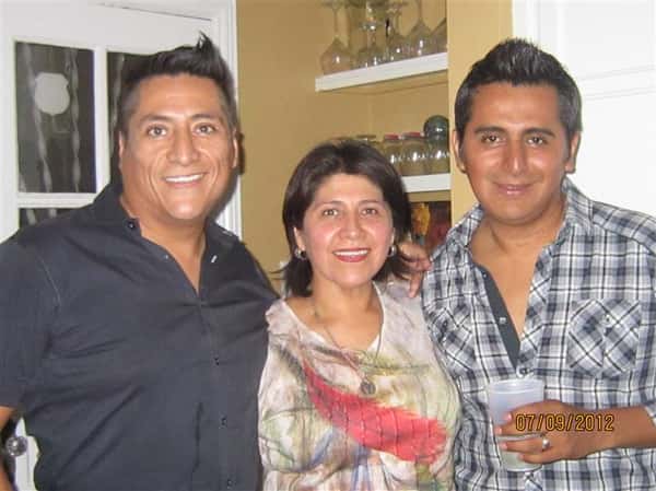 three people posing for a picture