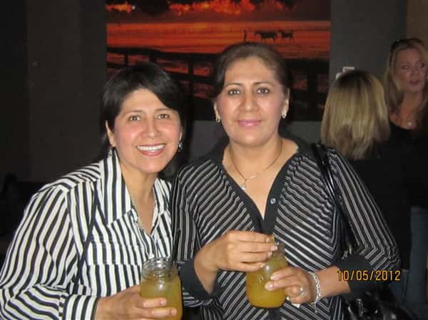 two females posing for picture