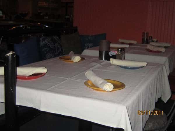 table with plates and silverware