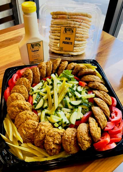 Falafel Baked Tray 25 Pcs with veggie +Pita+Tahini (Serves 12-20)