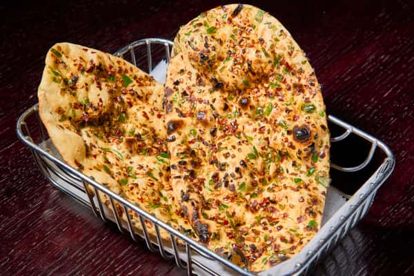 Herb and chili naan bread baked until golden and slightly charred
