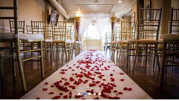 wedding aisle with rose petals