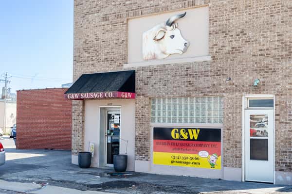 G&W Sausage Company storefront with brick exterior, signage, and entrance