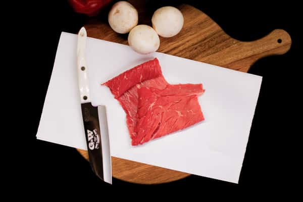 rolled and sliced beef rouladen cut showing thin layers of fresh meat