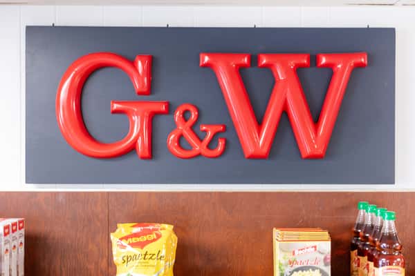 G&W Sandwiches interior with bold red logo sign and counter display