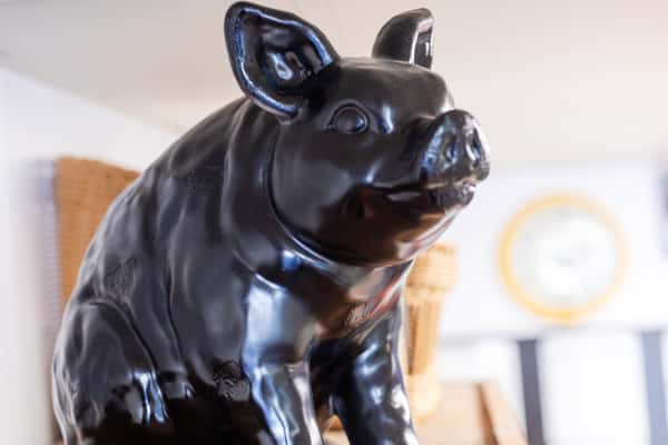 black pig statue decor inside G&W Sandwiches adding character to the shop interior