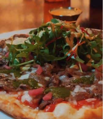Sliced "Ribeye Steak Melt" Pizza