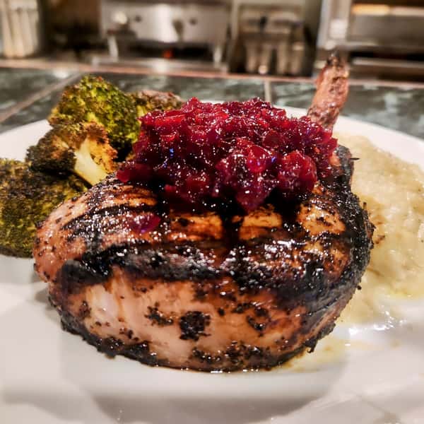 Grilled Pork Chop with a Cherry Cranberry Compote
