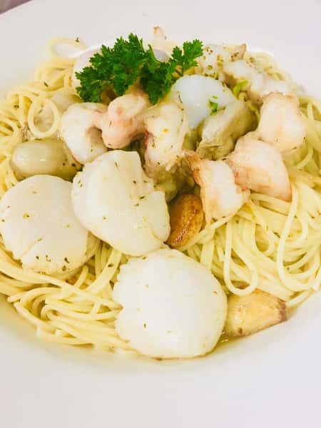 Seafood Scampi. Shrimp and scallops over spaghetti