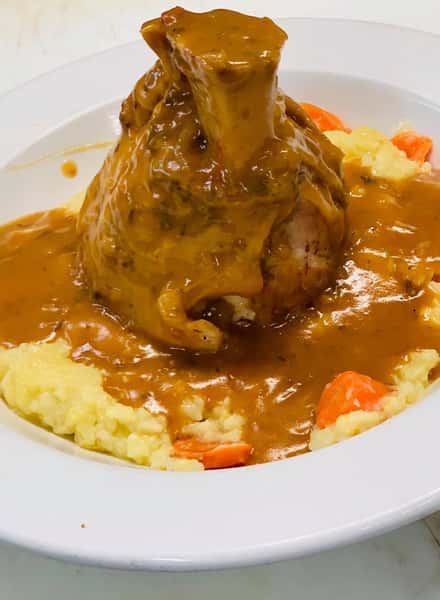 pork osso bucco (pork shank with gravy over mashed potatoes)