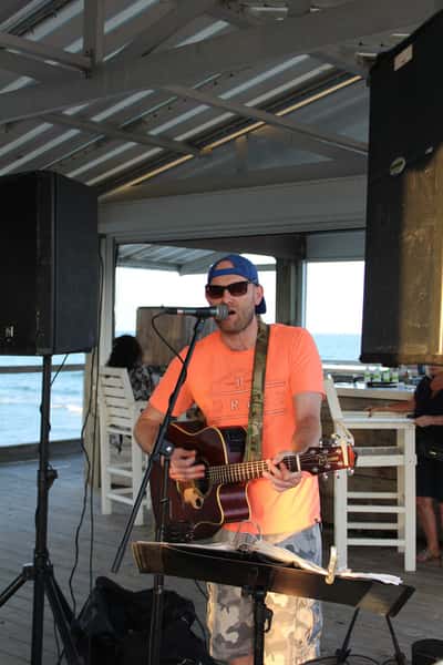 Musician playing a guitar