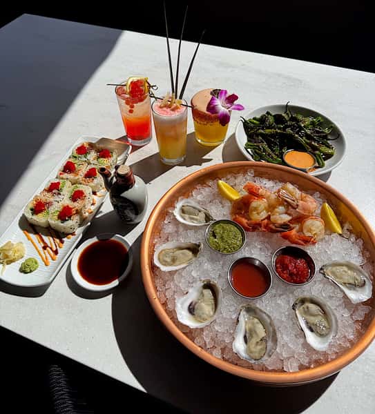 Oysters, sushi, shishito