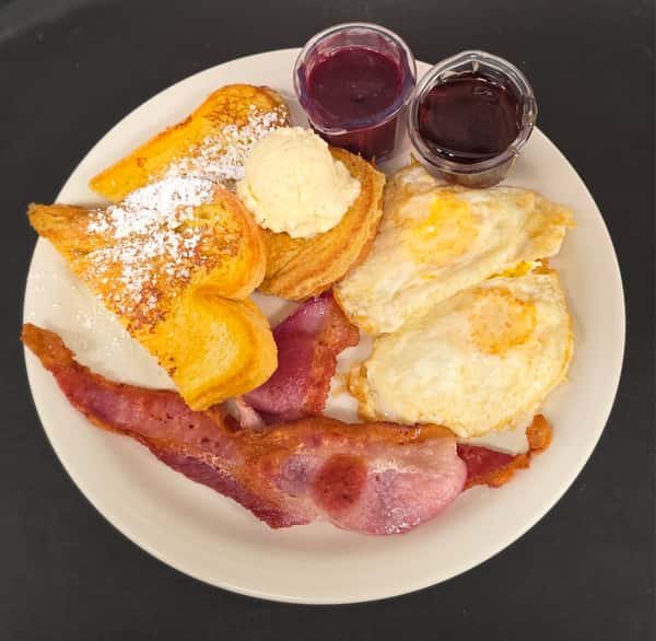 Sample photo of our French Toast Combo with Bacon, Over Hard Eggs and a side of our home-made Mixed Berry Compote