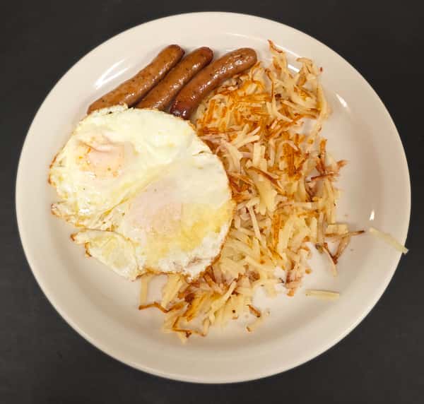 Sample photo of our Eggs Breakfast Combo with two Over Easy eggs, Sausage Links and Hash Browns