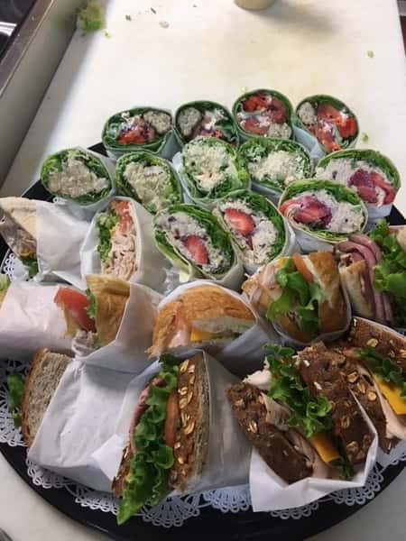 An arrangement Wraps and sandwiches