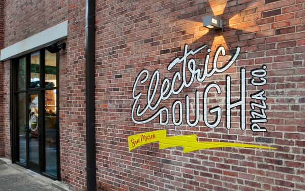 Logo on exterior brick wall