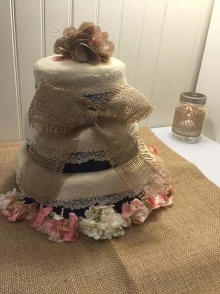 wedding cake decorated with a rustic theme