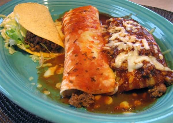 Combo plate with one taco, one enchilada and one chimichanga
