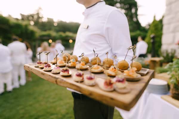 Waiter serving food