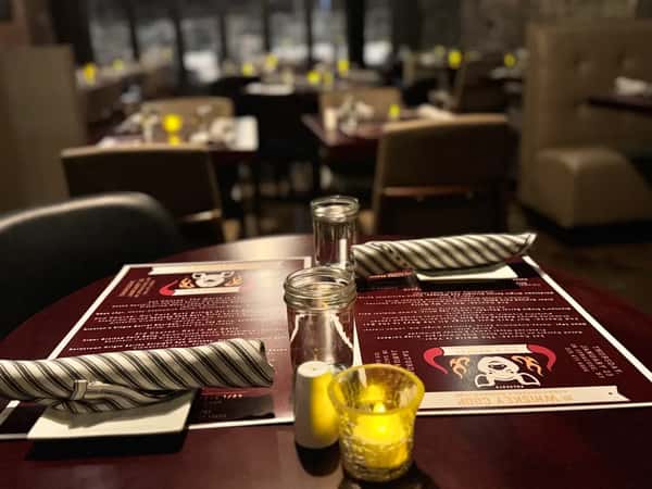 Table setting with menus and silverware