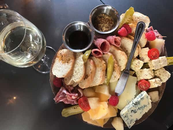 charcuterie board and wine