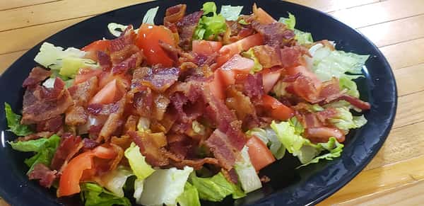 salad topped with bacon